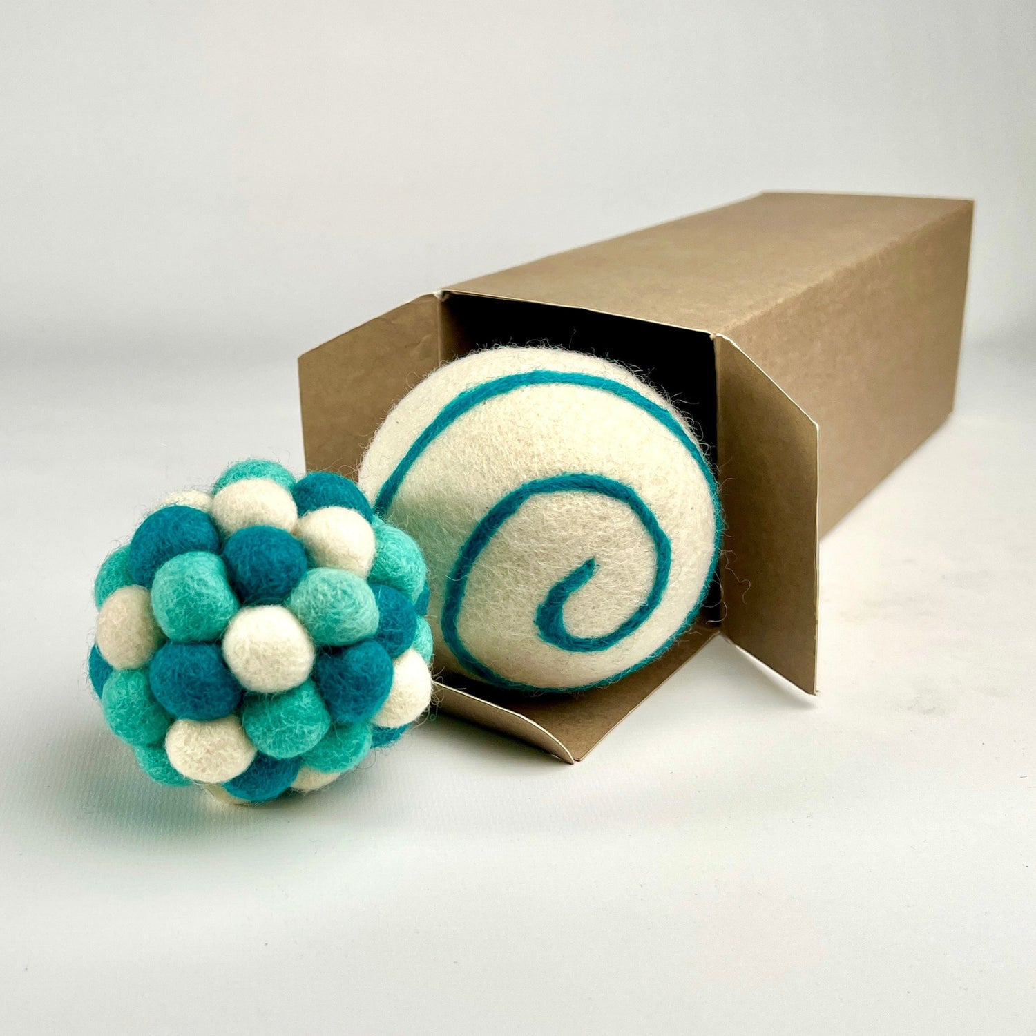 Cat Toys - two large felt balls in a box, blue multi-colour and white with blue swirl