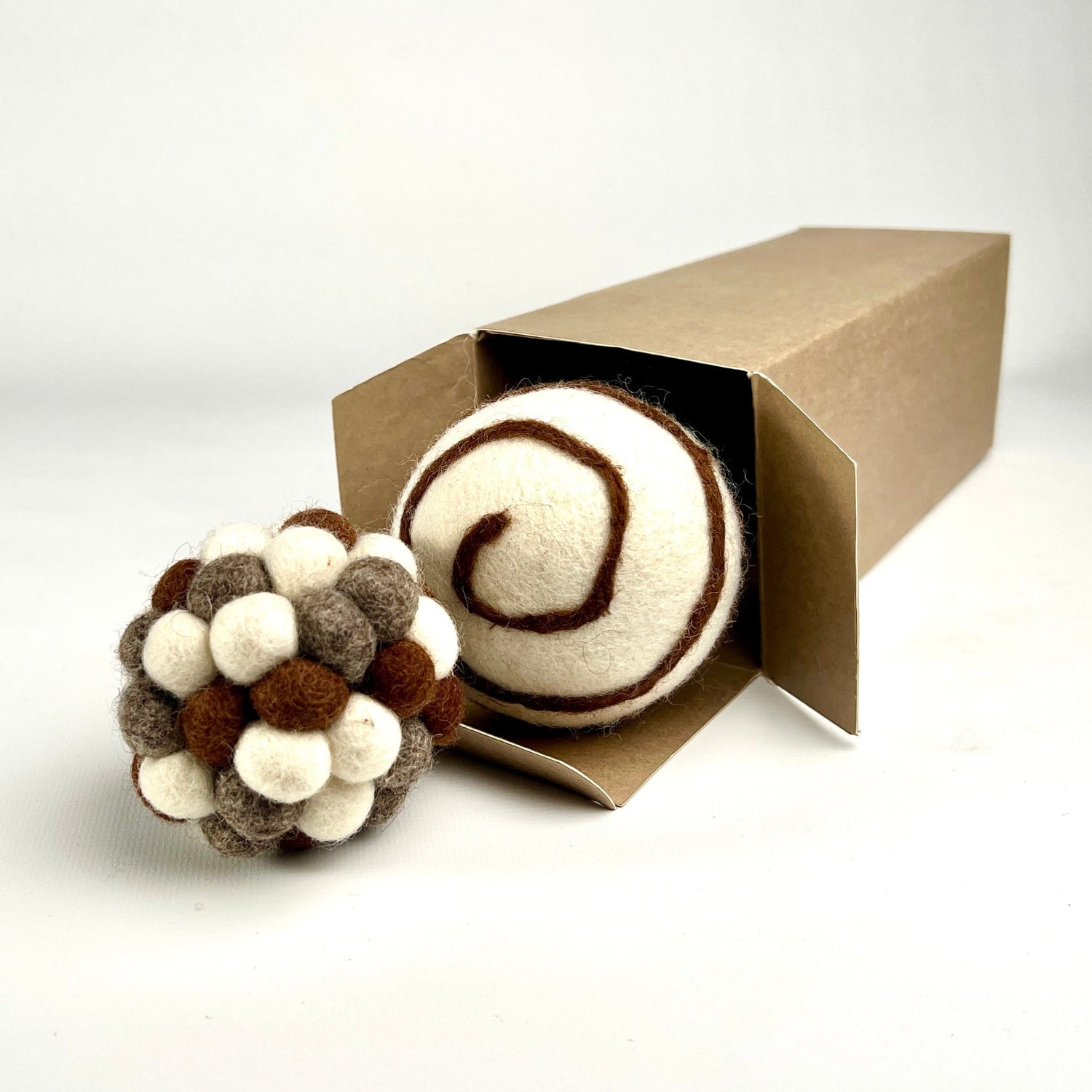 Cat Toys - two large felt balls in a box, neutral brown & white multi-colour and white with brown swirl