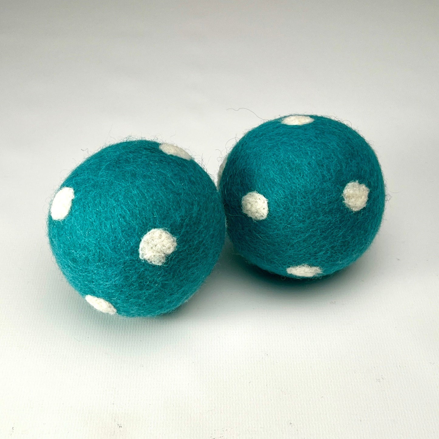 Dog Toys - blue felt balls with white dots - for indoor play.